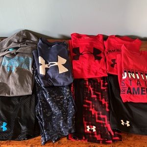 Four size small Under Armour outfits with bonus shirt